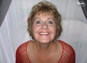 18 year old girl Megan Rain removes her sandals and then clothes to pose naked